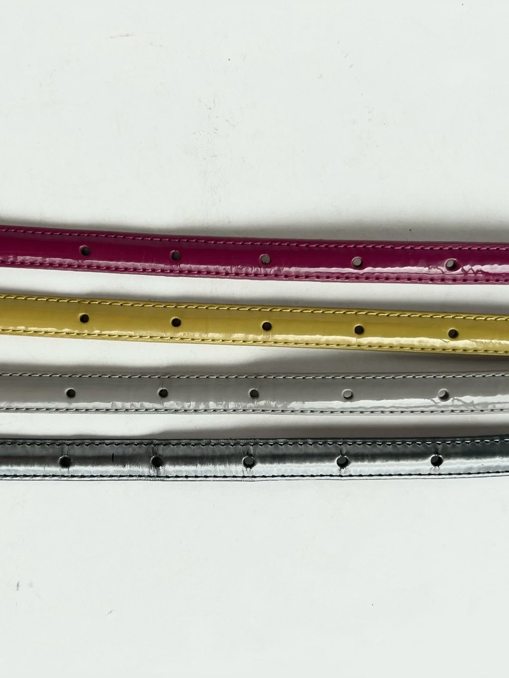 4 X Uniqlo lacquered leather skinny belt